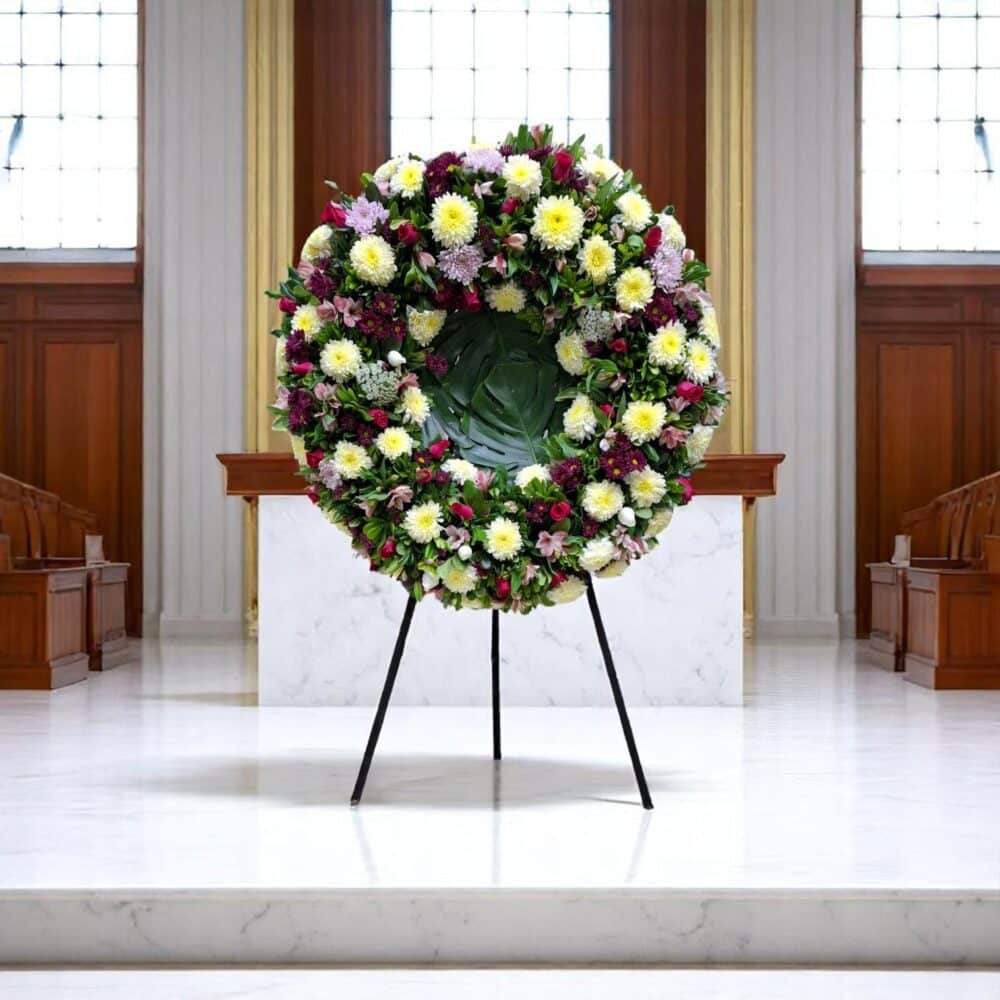 Corona Fúnebre Premium en Tripié – Rosas Vibrantes